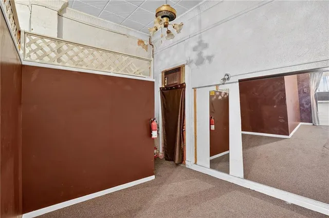 a view of a hallway with closet