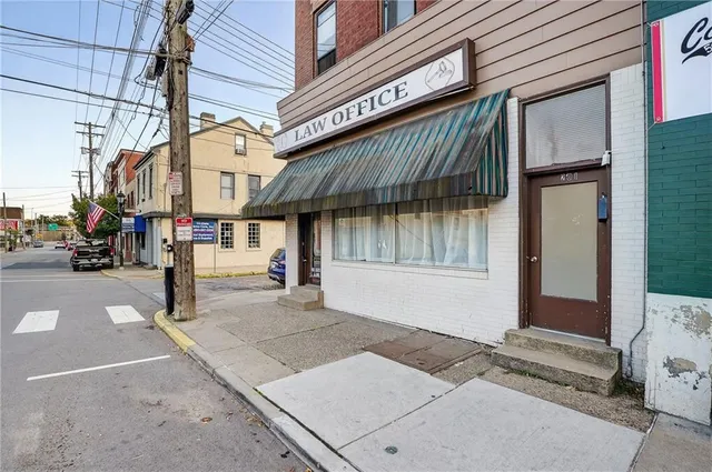 a view of a street with cars