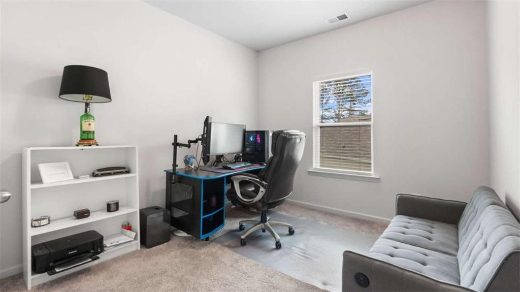 13 Maycroft Court Rome, GA 30161 - Photo 16 of 28 a view of a workspace with furniture and a window