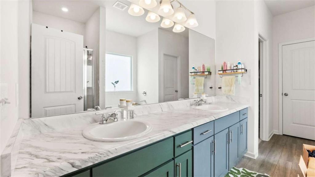 13 Maycroft Court Rome, GA 30161 - Photo 19 of 28 a bathroom with a granite countertop sink and a mirror