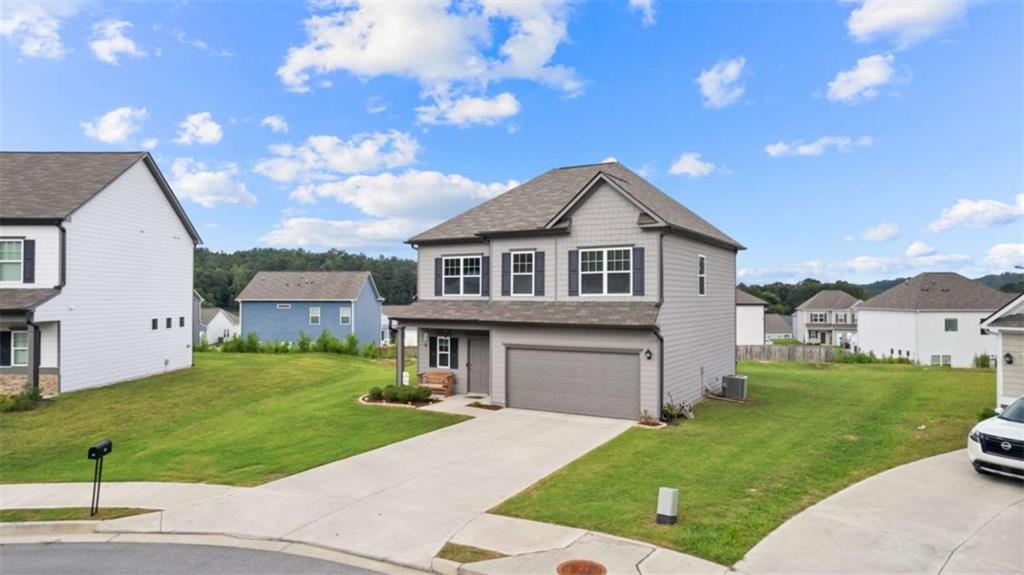 13 Maycroft Court Rome, GA 30161 - Photo 2 of 28 a front view of a house with a yard