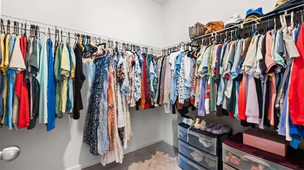 13 Maycroft Court Rome, GA 30161 - Photo 21 of 28 a view of walk in closet with clothes