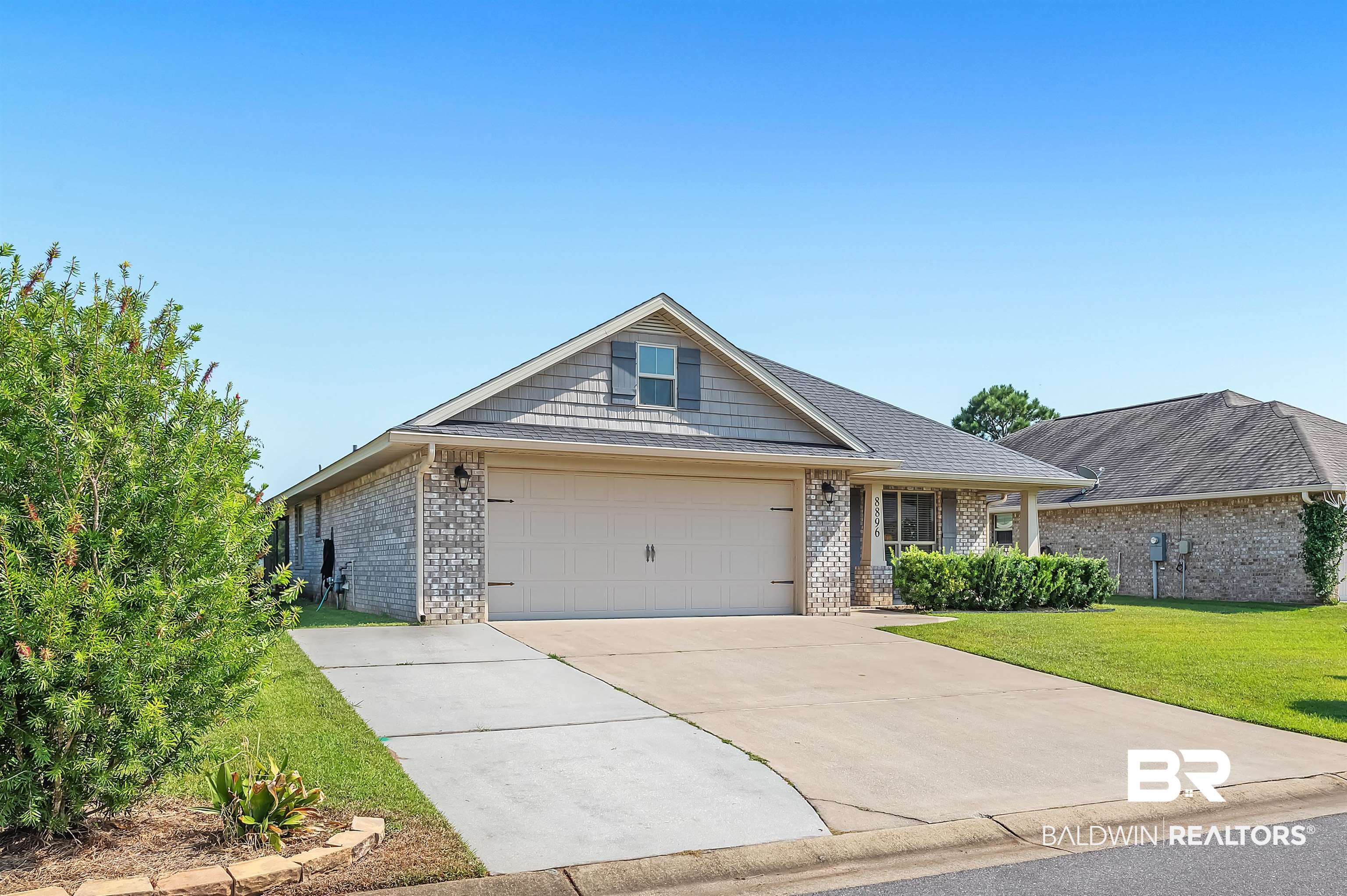 8896 Allay Lane Foley, AL 36535 - Photo 3 of 57 Single story home with a front lawn and a garage