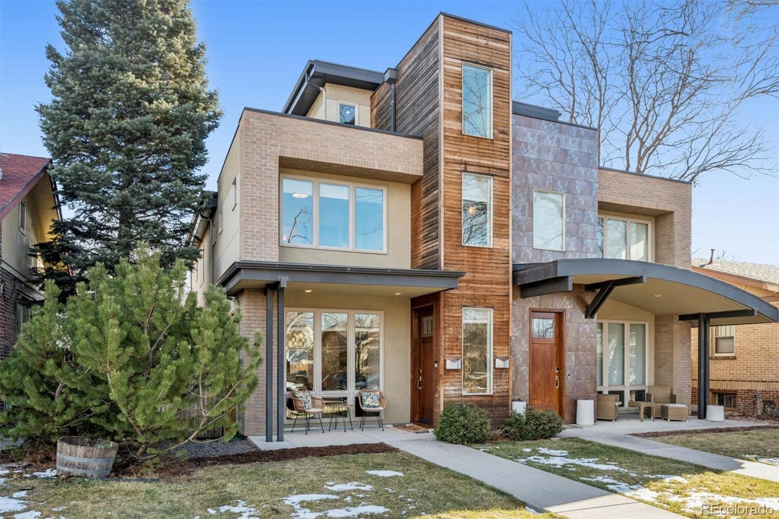 a front view of a building with a porch
