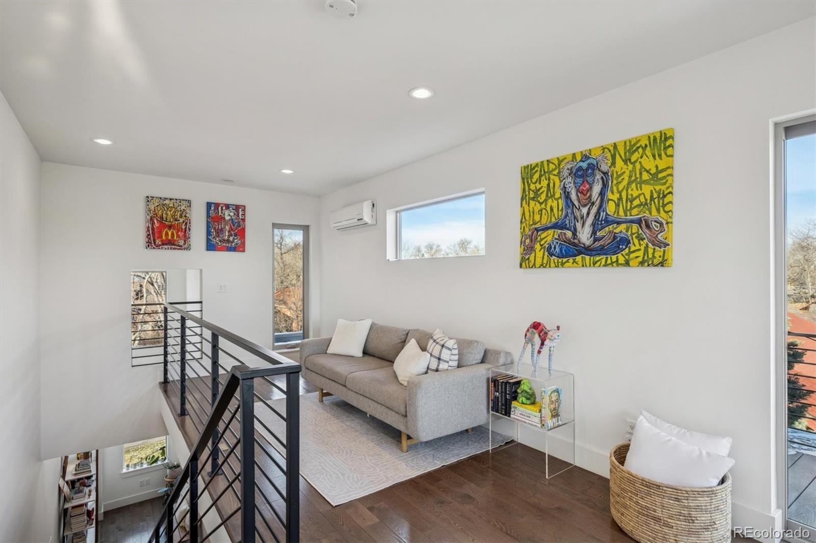 3422 Newton Street Denver, CO 80211 - Photo 23 of 37 a living room with furniture and a wooden floor