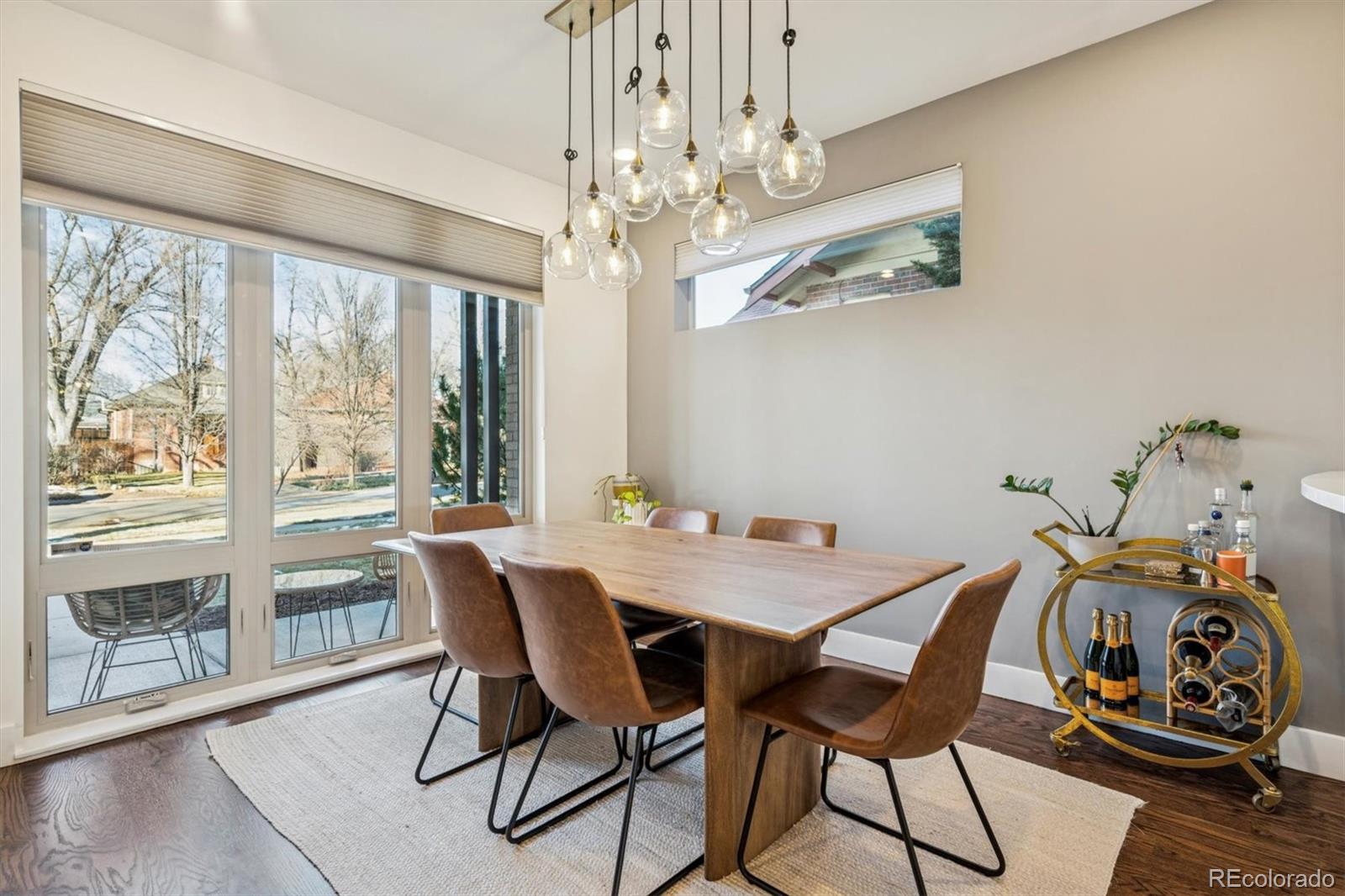 3422 Newton Street Denver, CO 80211 - Photo 7 of 37 a view of a dining room with furniture window and outside view