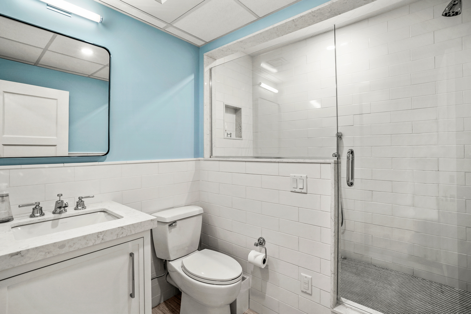 2 Marion Avenue Nantucket, MA 02554 - Photo 35 of 43 a bathroom with a granite countertop sink a toilet and a mirror