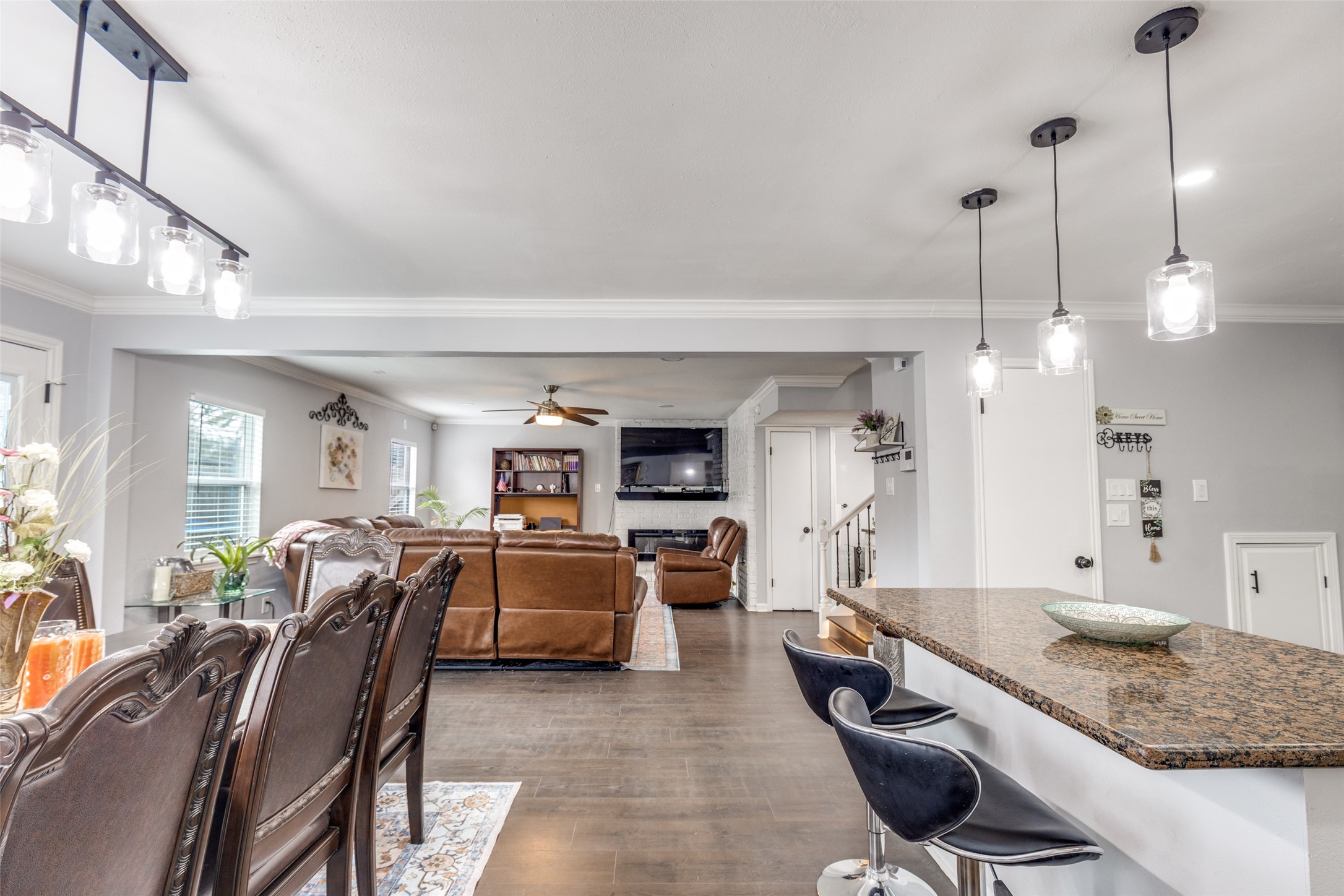 605 South Remington Drive Angleton, TX 77515 - Photo 8 of 25 a kitchen with granite countertop lots of counter top space and stainless steel appliances