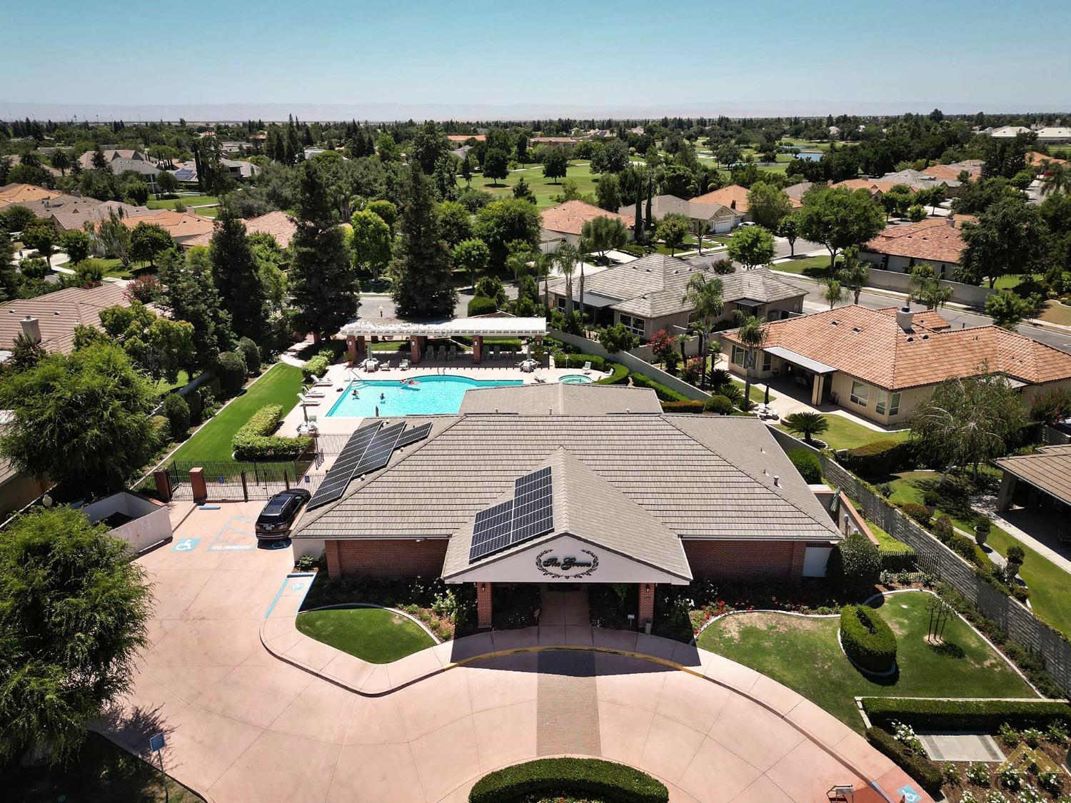 Undisclosed Address Bakersfield, CA 93311 - Photo 4 of 34 an aerial view of a house with yard swimming pool and lake view