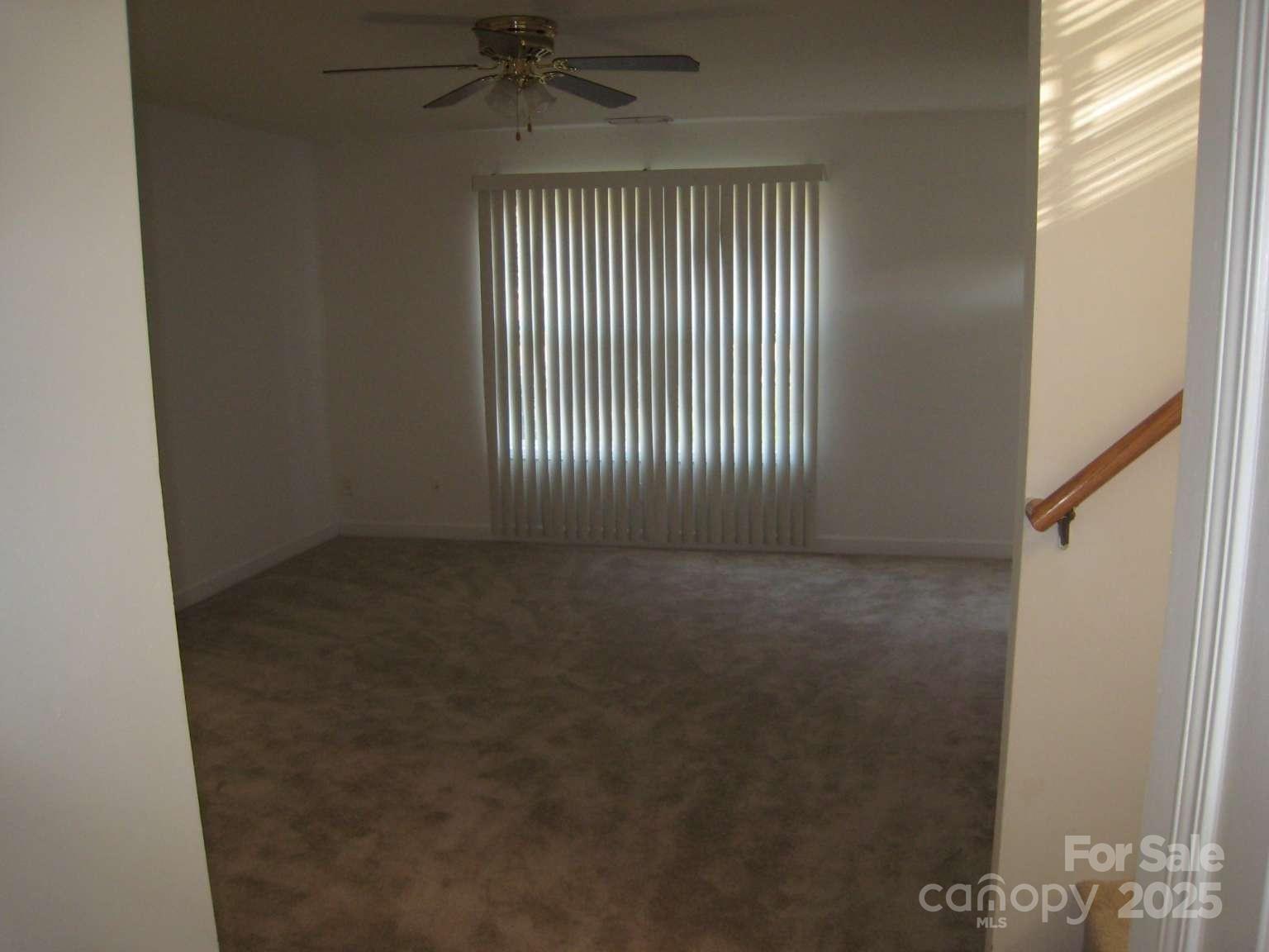 4653 Perkins Road Charlotte, NC 28269 - Photo 12 of 16 a view of a livingroom with a window
