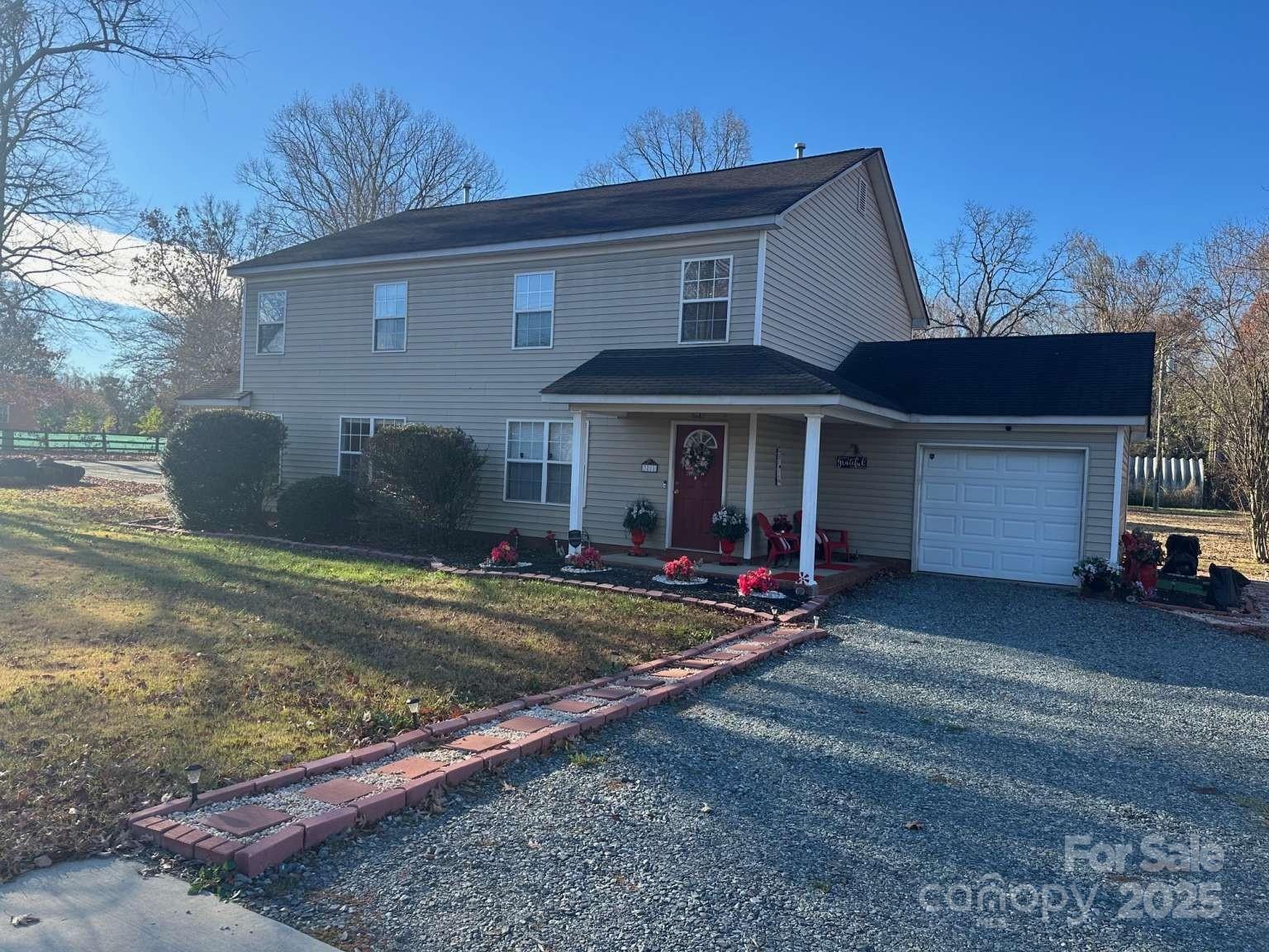 4653 Perkins Road Charlotte, NC 28269 - Photo 2 of 16 a view of a house with backyard