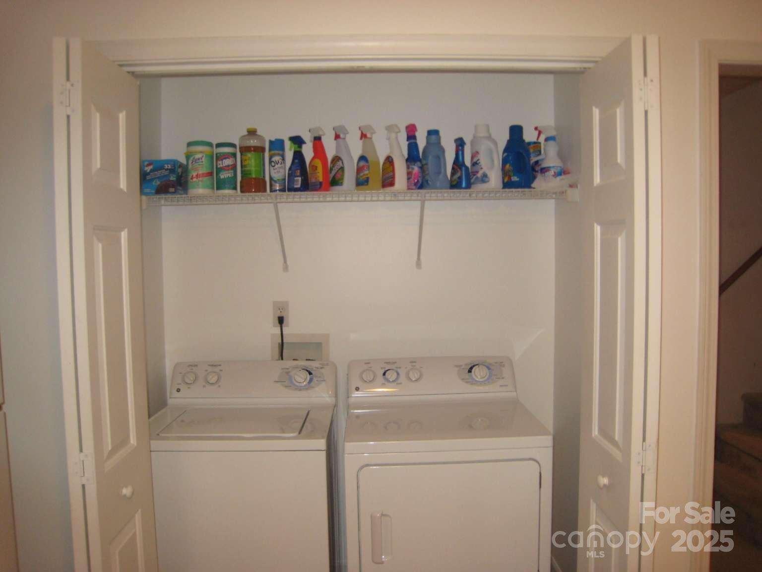 4653 Perkins Road Charlotte, NC 28269 - Photo 10 of 16 a view of storage and utility room with washer and dryer