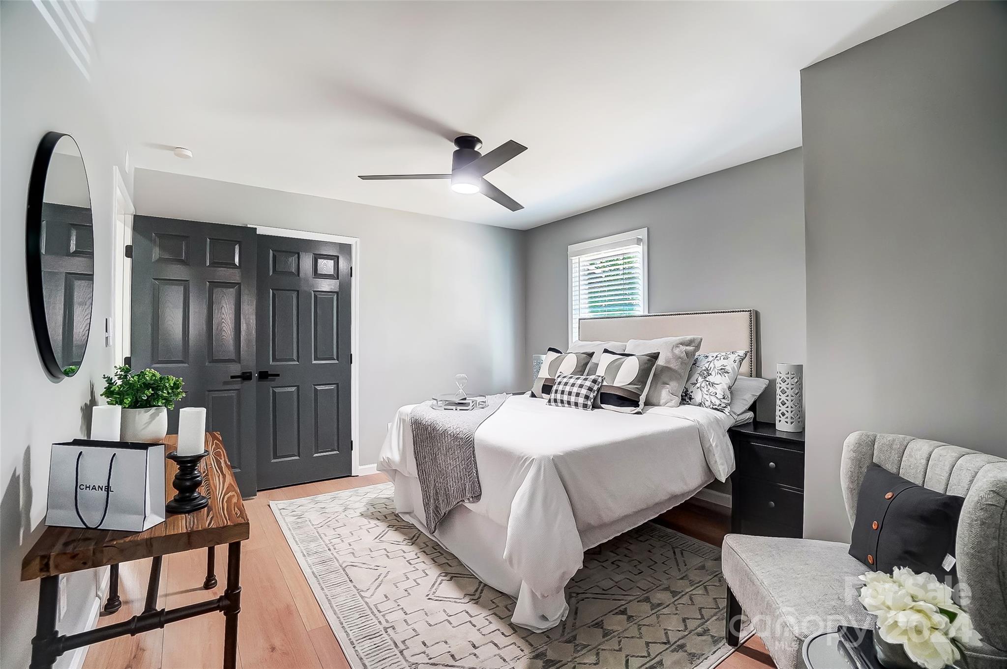 131 Hickory Lane York, SC 29745 - Photo 11 of 25 a bedroom with a bed a couch and dresser