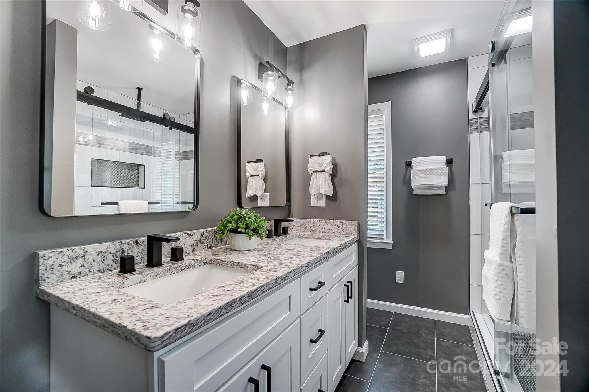 131 Hickory Lane York, SC 29745 - Photo 12 of 25 a bathroom with a granite countertop sink and a mirror