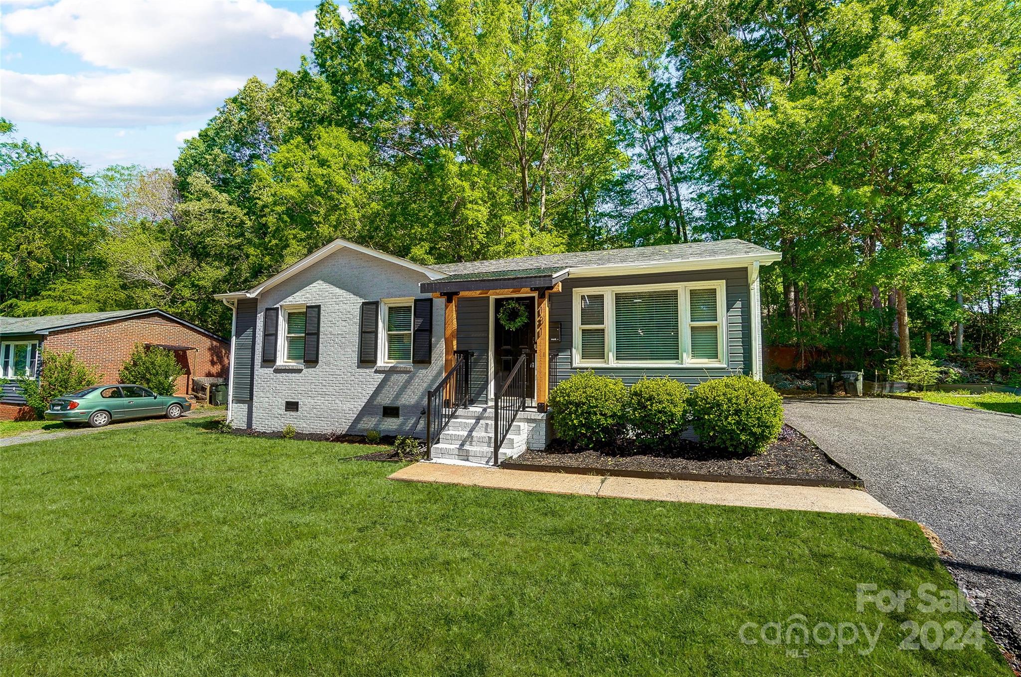 131 Hickory Lane York, SC 29745 - Photo 23 of 25 a front view of a house with a yard