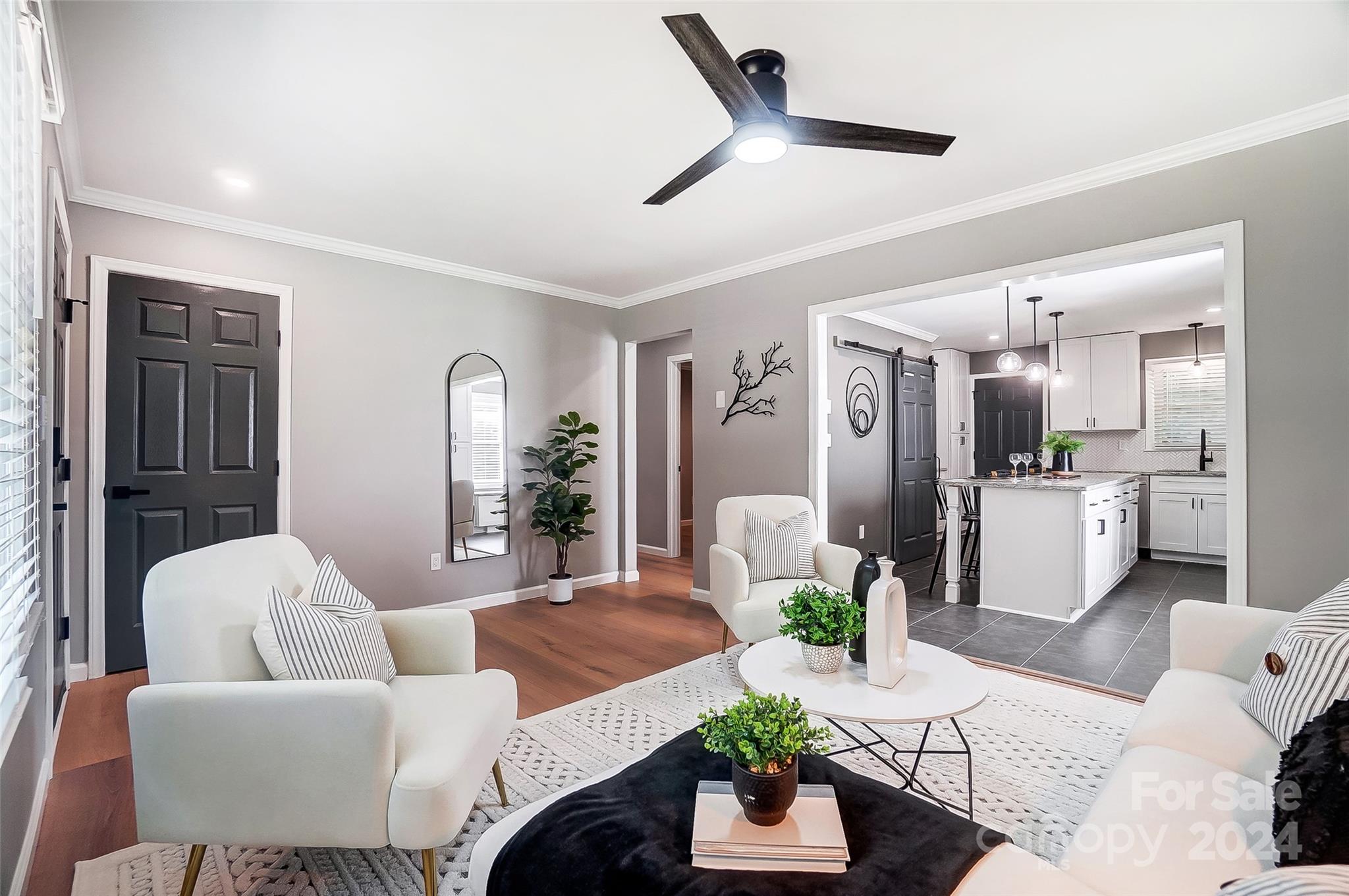 131 Hickory Lane York, SC 29745 - Photo 7 of 25 a living room with furniture kitchen and a chandelier