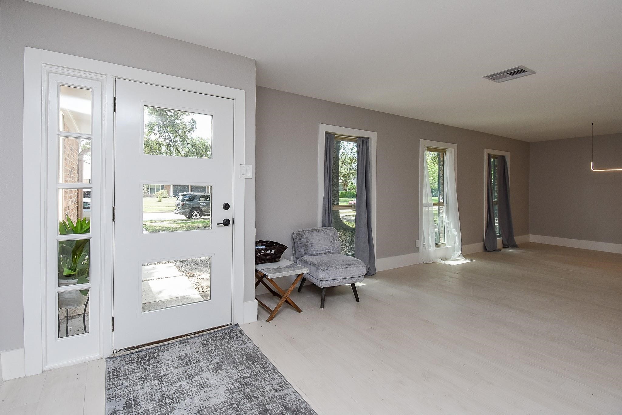 7618 Highmeadow Drive Houston, TX 77063 - Photo 15 of 48 a view of a livingroom with furniture and windows