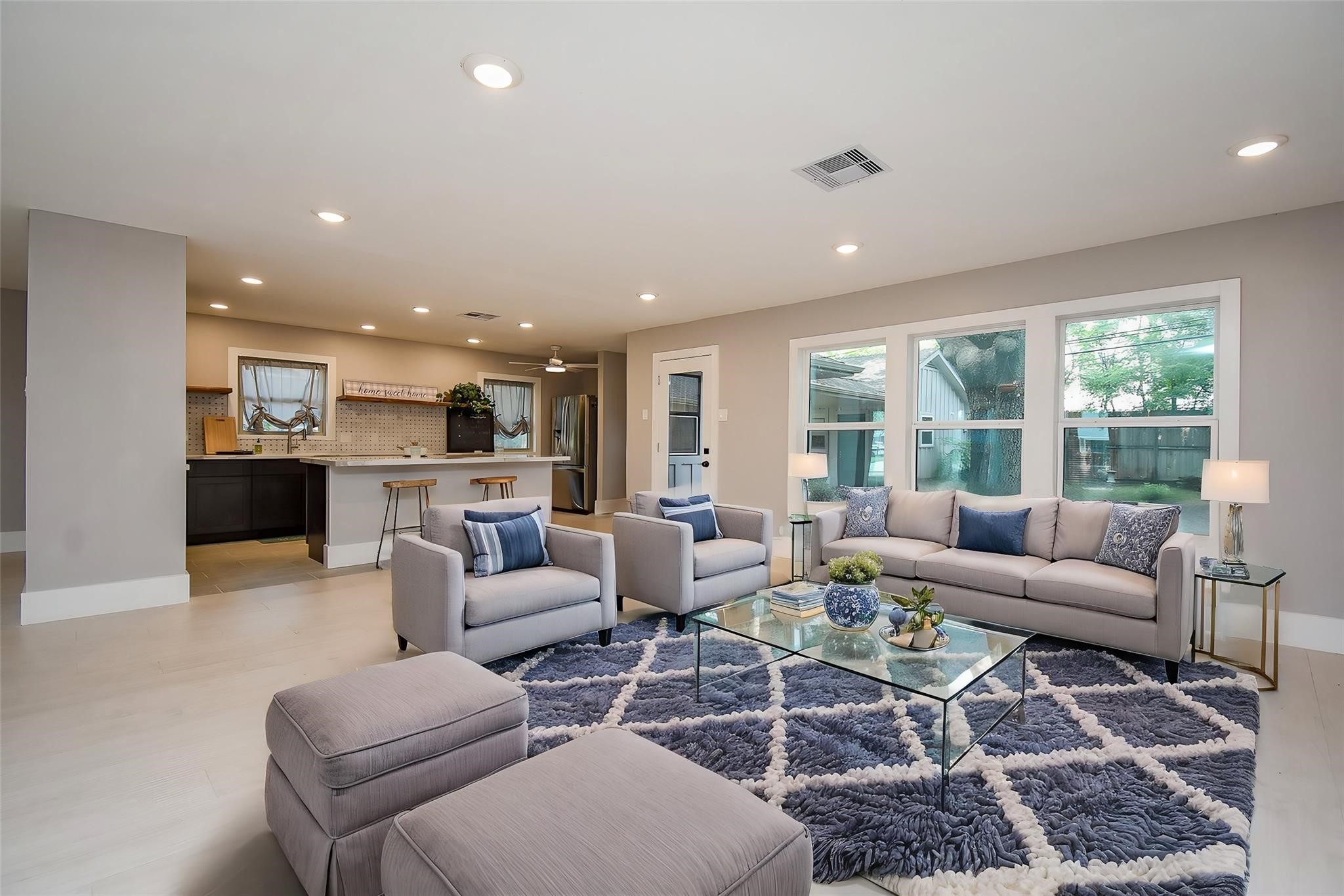 7618 Highmeadow Drive Houston, TX 77063 - Photo 3 of 48 a living room with furniture wooden floor and a large window