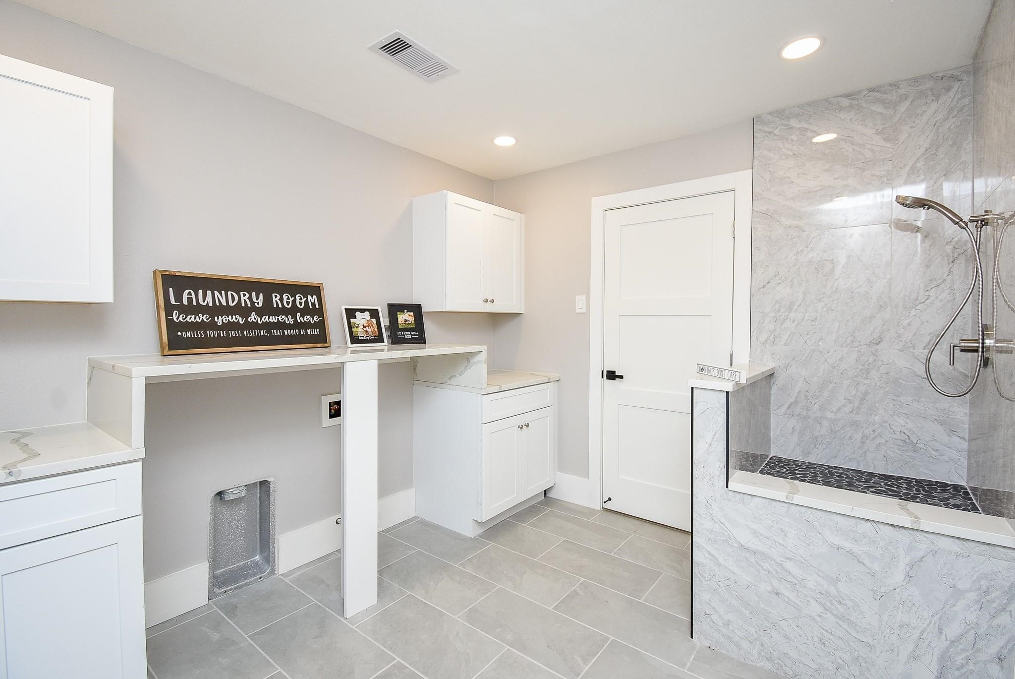 7618 Highmeadow Drive Houston, TX 77063 - Photo 34 of 48 a view of a storage & utility room with a sink