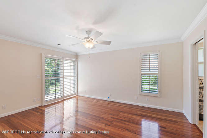 1371 Lands End Road Lantana, FL 33462 - Photo 3 of 39 a view of an empty room with wooden floor and a window