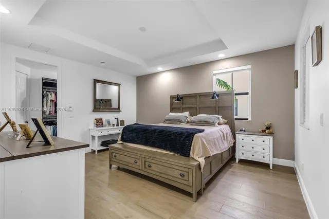 a bathroom with a toilet and a rug