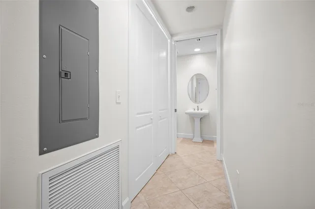 a spacious bathroom with a granite countertop sink a toilet and shower