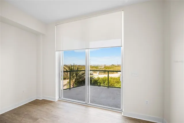a view of a swimming pool with outdoor seating