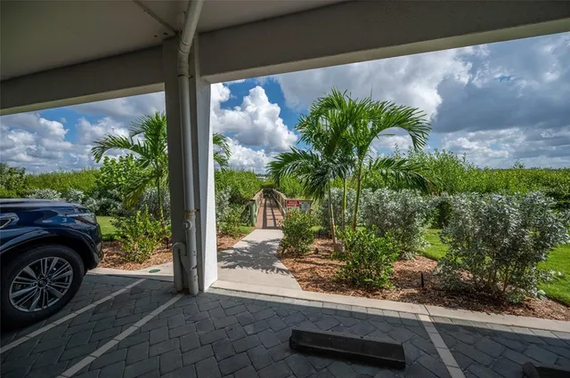 an aerial view of a house with a ocean view