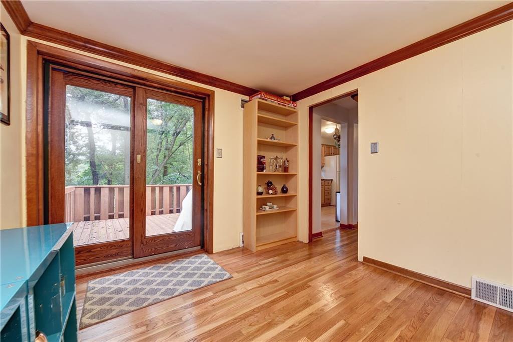 6644 Landview Road Pittsburgh, PA 15217 - Photo 9 of 25 1st floor Den would make the perfect home office, library, butlers pantry or impromptu guest bedroom space. Sliding doors to the oversized deck.
