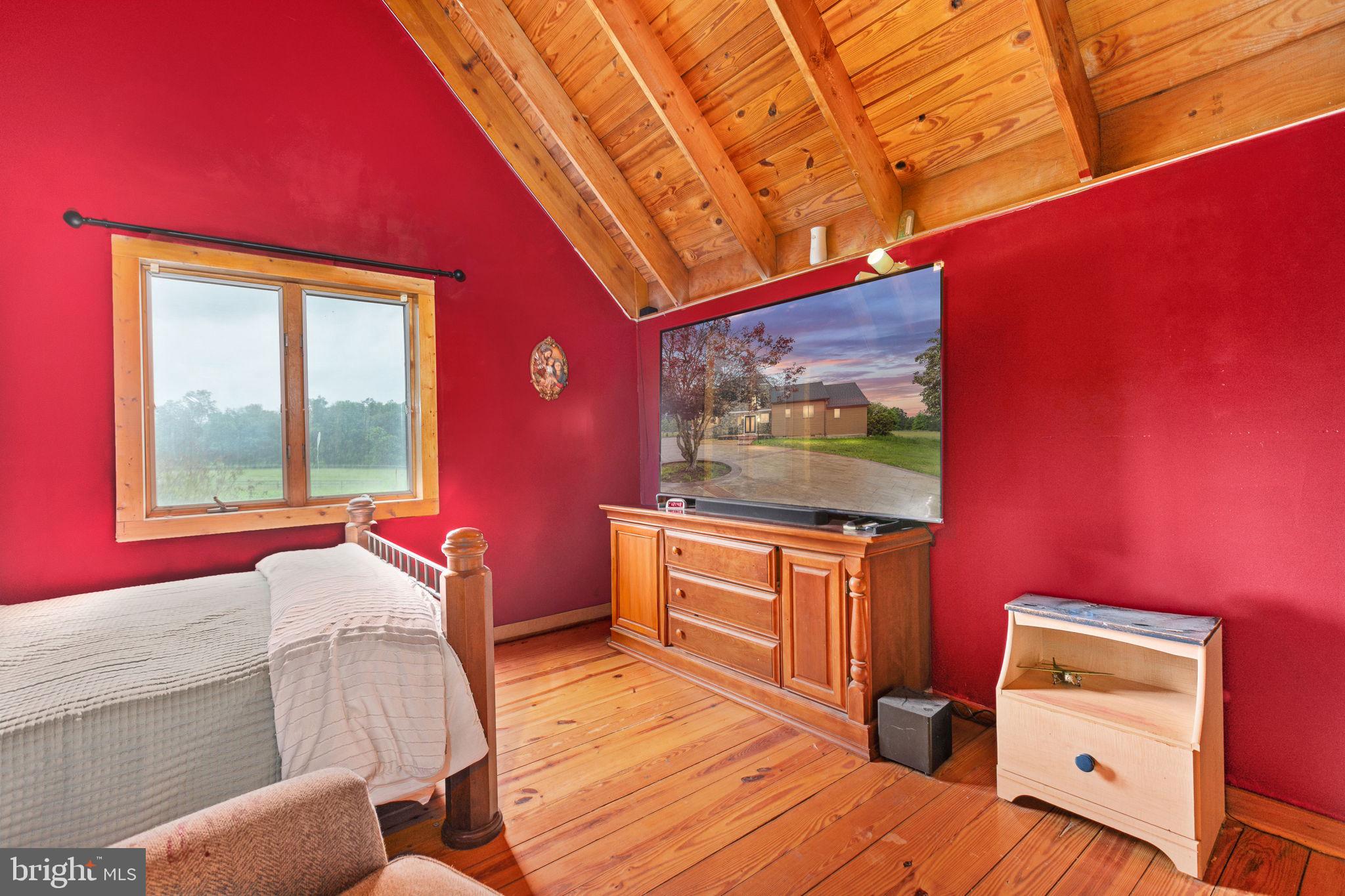 6119 Beach Road Midland, VA 22728 - Photo 45 of 98 a bedroom with furniture and a window