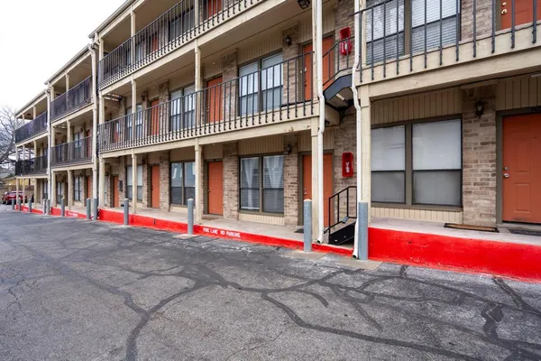 a front view of building with street