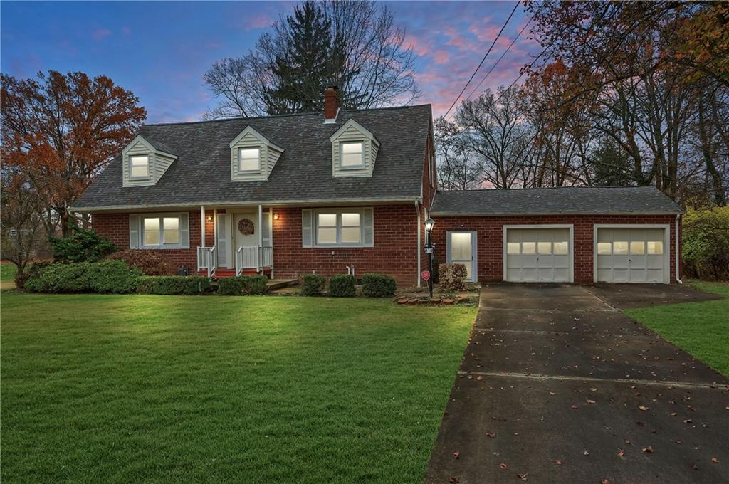 212 Tulagi Way New Castle, PA 16105 - Photo 1 of 30 a front view of a house with garden