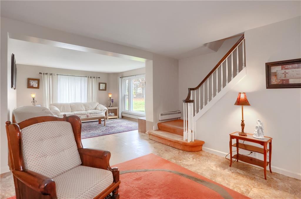 212 Tulagi Way New Castle, PA 16105 - Photo 15 of 30 a living room with furniture and a wooden floor