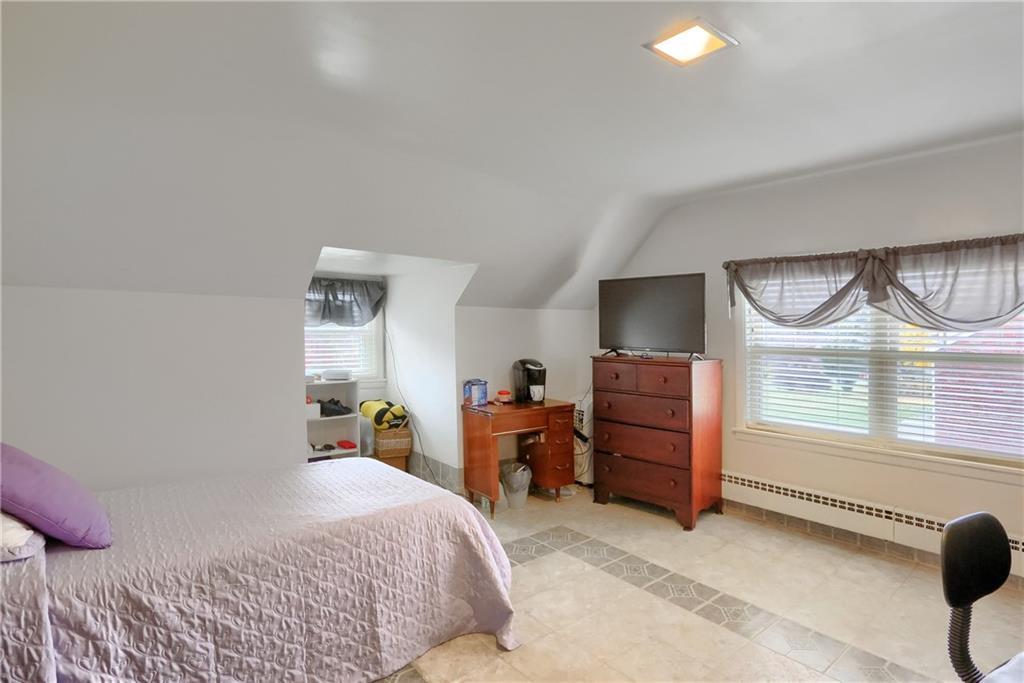 212 Tulagi Way New Castle, PA 16105 - Photo 17 of 30 a bedroom with a bed and a window