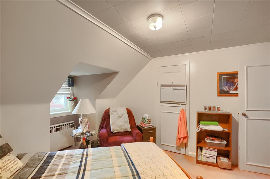212 Tulagi Way New Castle, PA 16105 - Photo 21 of 30 a room with furniture a rug and white walls