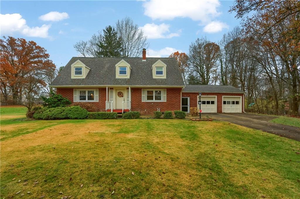 212 Tulagi Way New Castle, PA 16105 - Photo 24 of 30 a front view of a house with garden