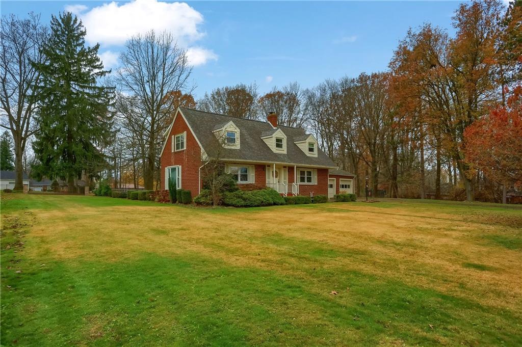212 Tulagi Way New Castle, PA 16105 - Photo 25 of 30 a front view of a house with a garden
