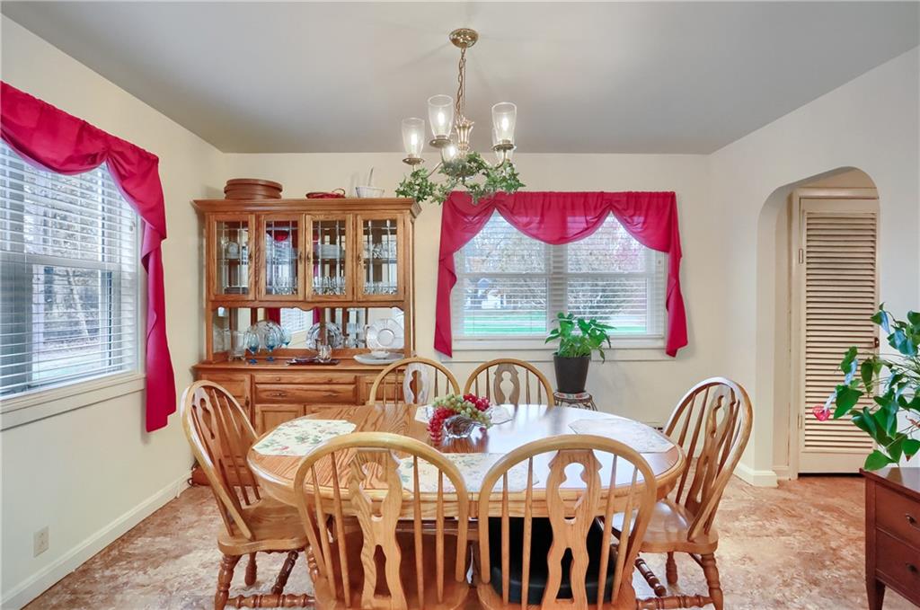 212 Tulagi Way New Castle, PA 16105 - Photo 6 of 30 a view of a dining room with furniture window and wooden floor