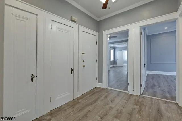 a view of a bathroom from a hallway