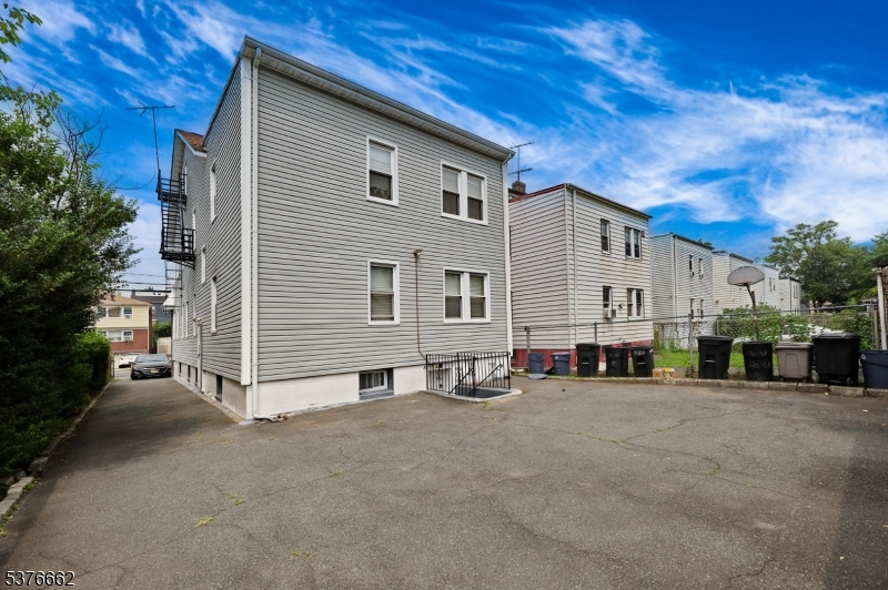 90 Norman Road Newark, NJ 07106 - Photo 5 of 31 a view of a house with a outdoor space