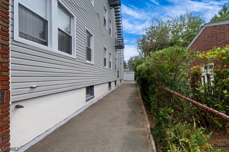 90 Norman Road Newark, NJ 07106 - Photo 6 of 31 a view of a house with a street