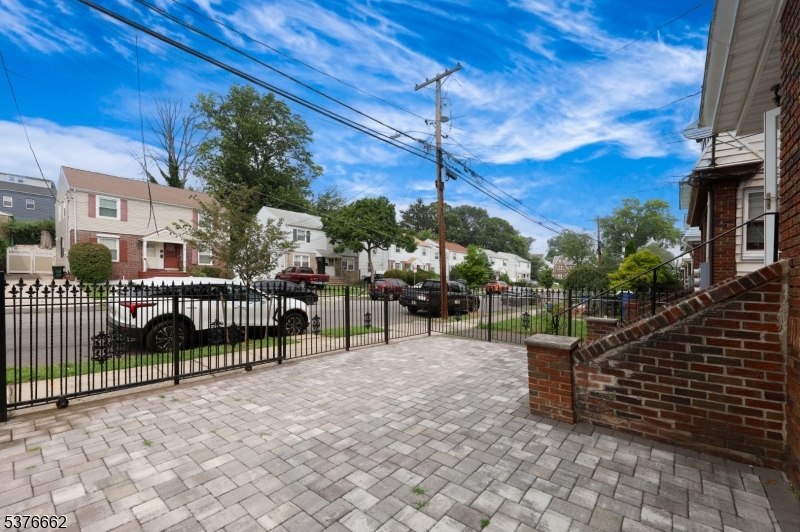 90 Norman Road Newark, NJ 07106 - Photo 7 of 31 a view of a chairs and tables in the patio