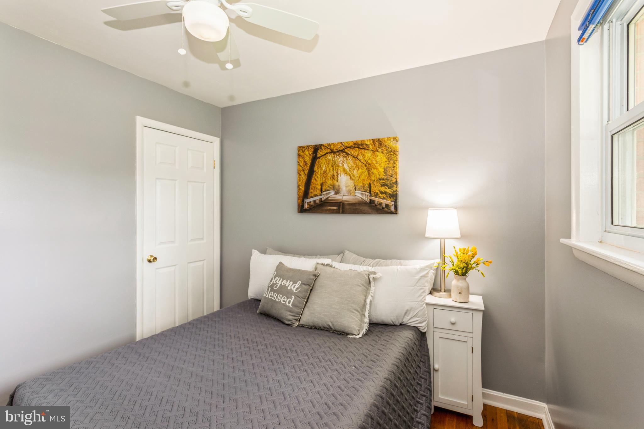 7403 Conway Court Springfield, VA 22150 - Photo 18 of 32 Bedroom #3 lots of natural light & hardwood floors