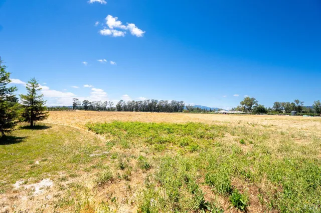 a view of an ocean and swimming pool