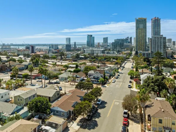 a view of a city with tall buildings
