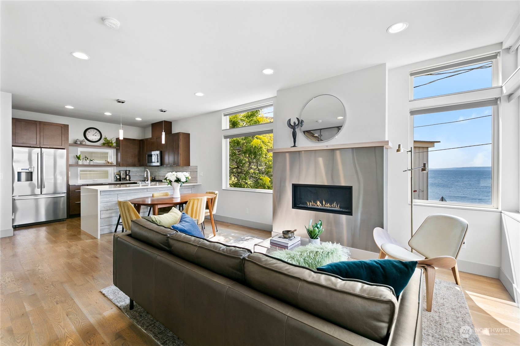 3226 Alki Avenue Southwest Seattle, WA 98116 - Photo 2 of 39 a living room with furniture and a fireplace