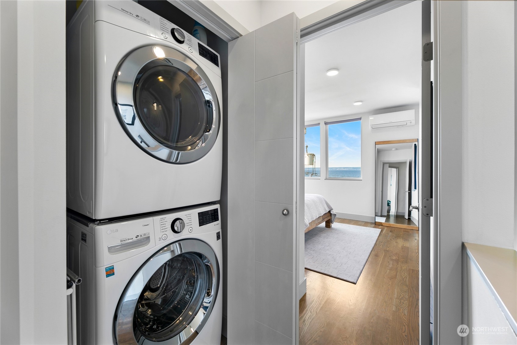 3226 Alki Avenue Southwest Seattle, WA 98116 - Photo 22 of 39 a view of a hallway with washer and dryer