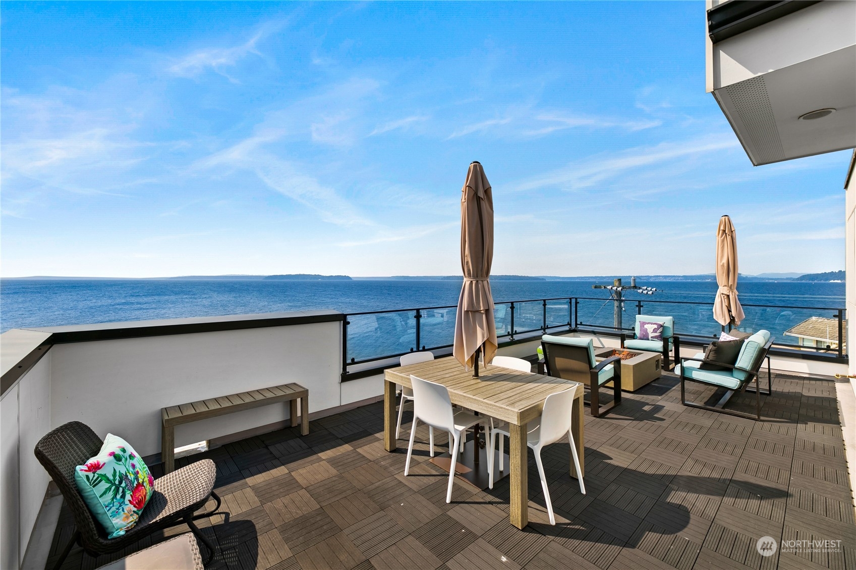 3226 Alki Avenue Southwest Seattle, WA 98116 - Photo 24 of 39 a terrace with outdoor seating and city view