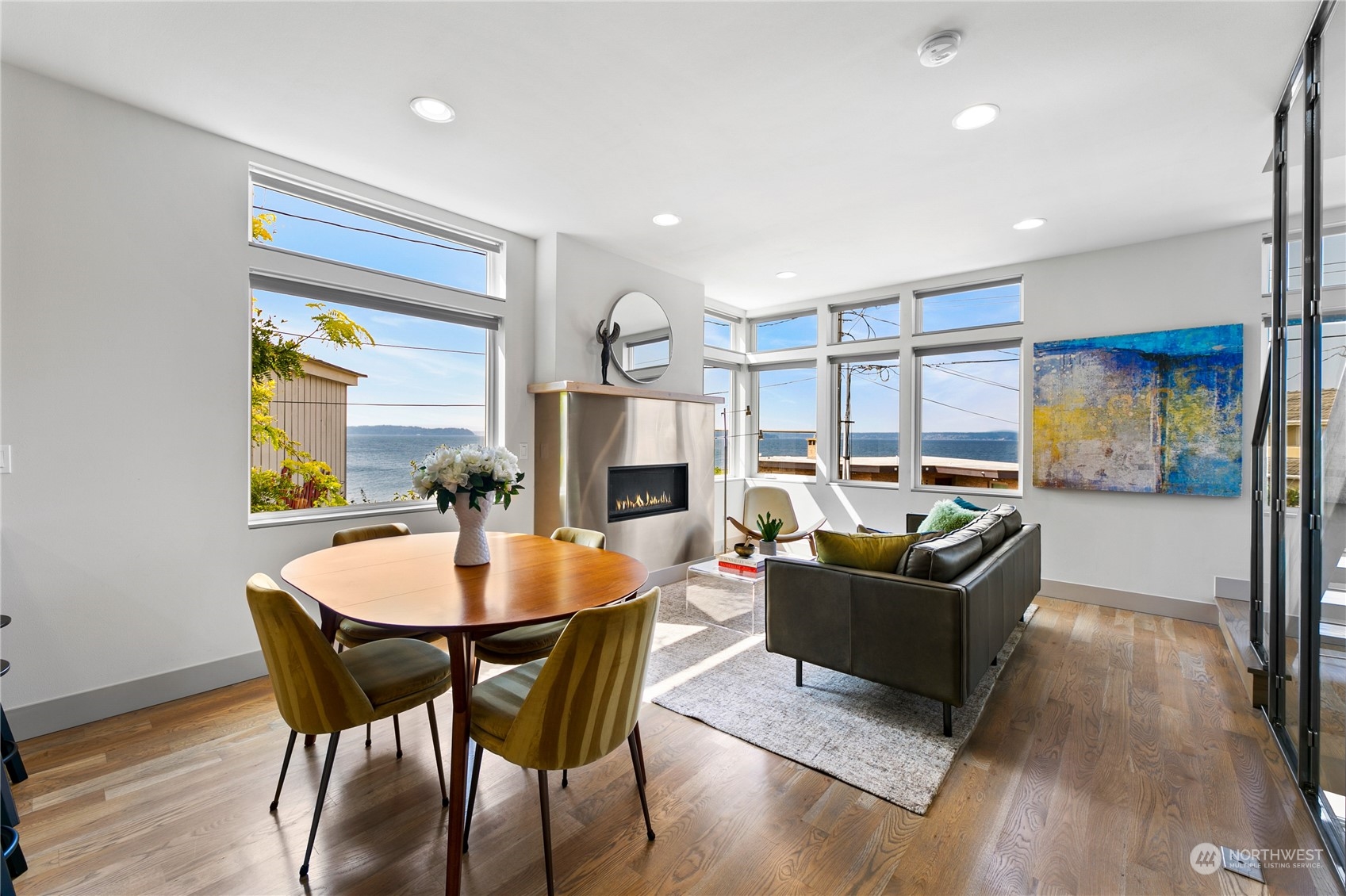3226 Alki Avenue Southwest Seattle, WA 98116 - Photo 3 of 39 a living room with fireplace furniture and a wooden floor