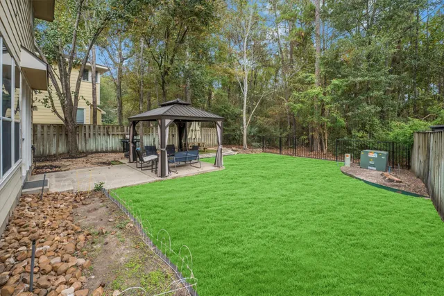 a view of a park with bench and a table